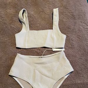 Top and Bottom from Wanderlust swim. Brand new never worn. NWT